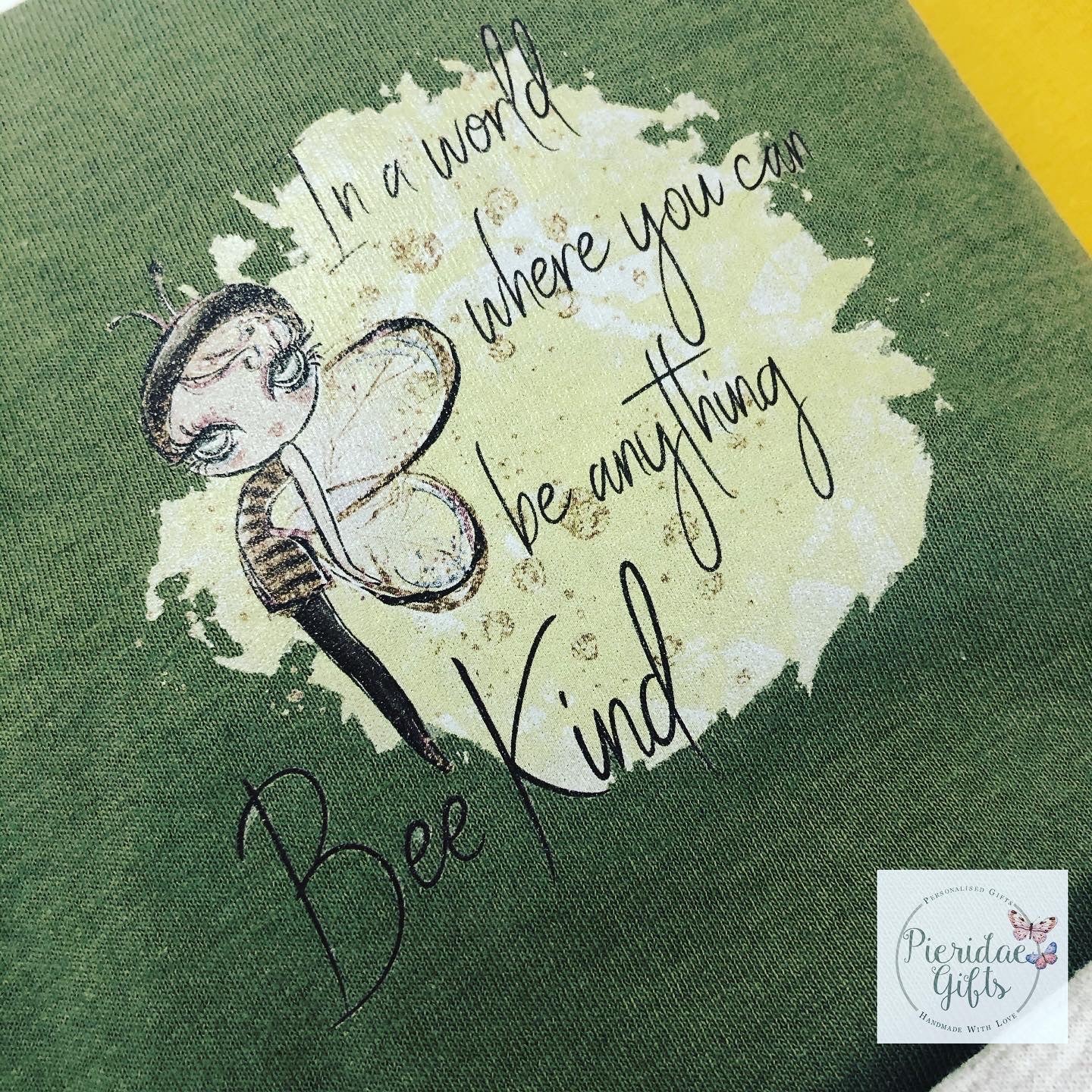 In a world where you can be anything, BEE KIND Adult Tee