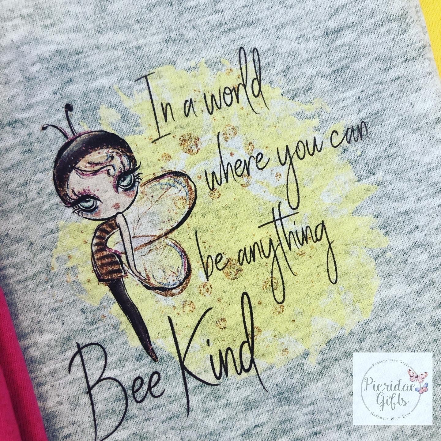 In a world where you can be anything, BEE KIND Adult Tee